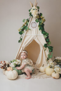 joanna booth photography 1-year old milestone photography session in a vintage and creative setup with florals